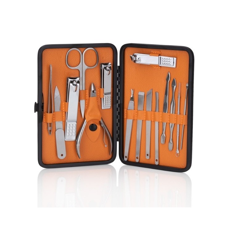 Set of 15 cosmetic accessories for manicure , pedicure and facial treatments in a Black and Brown case